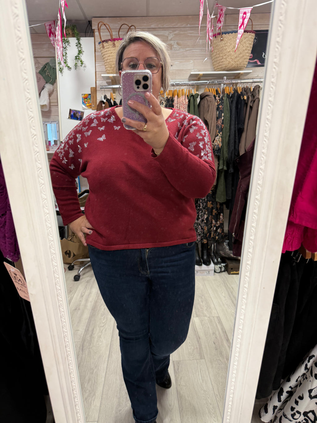Pull bordeaux papillon
