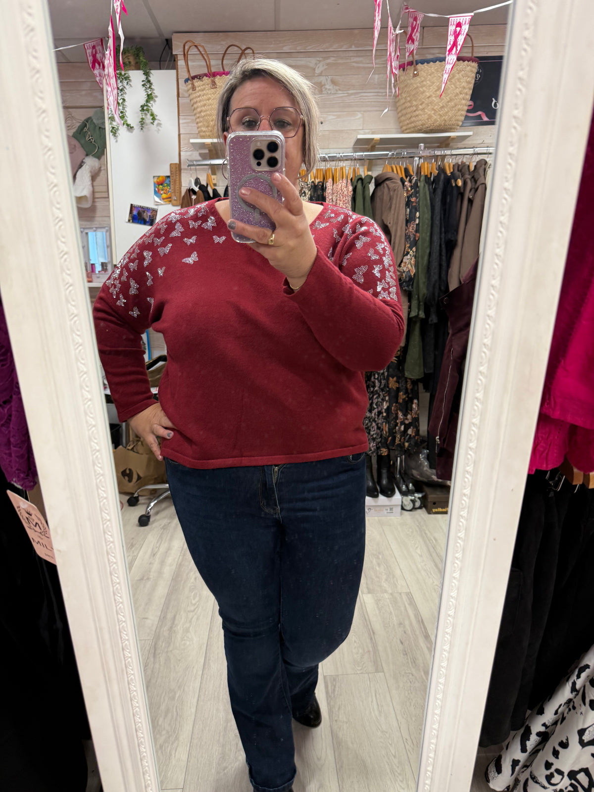 Pull bordeaux papillon