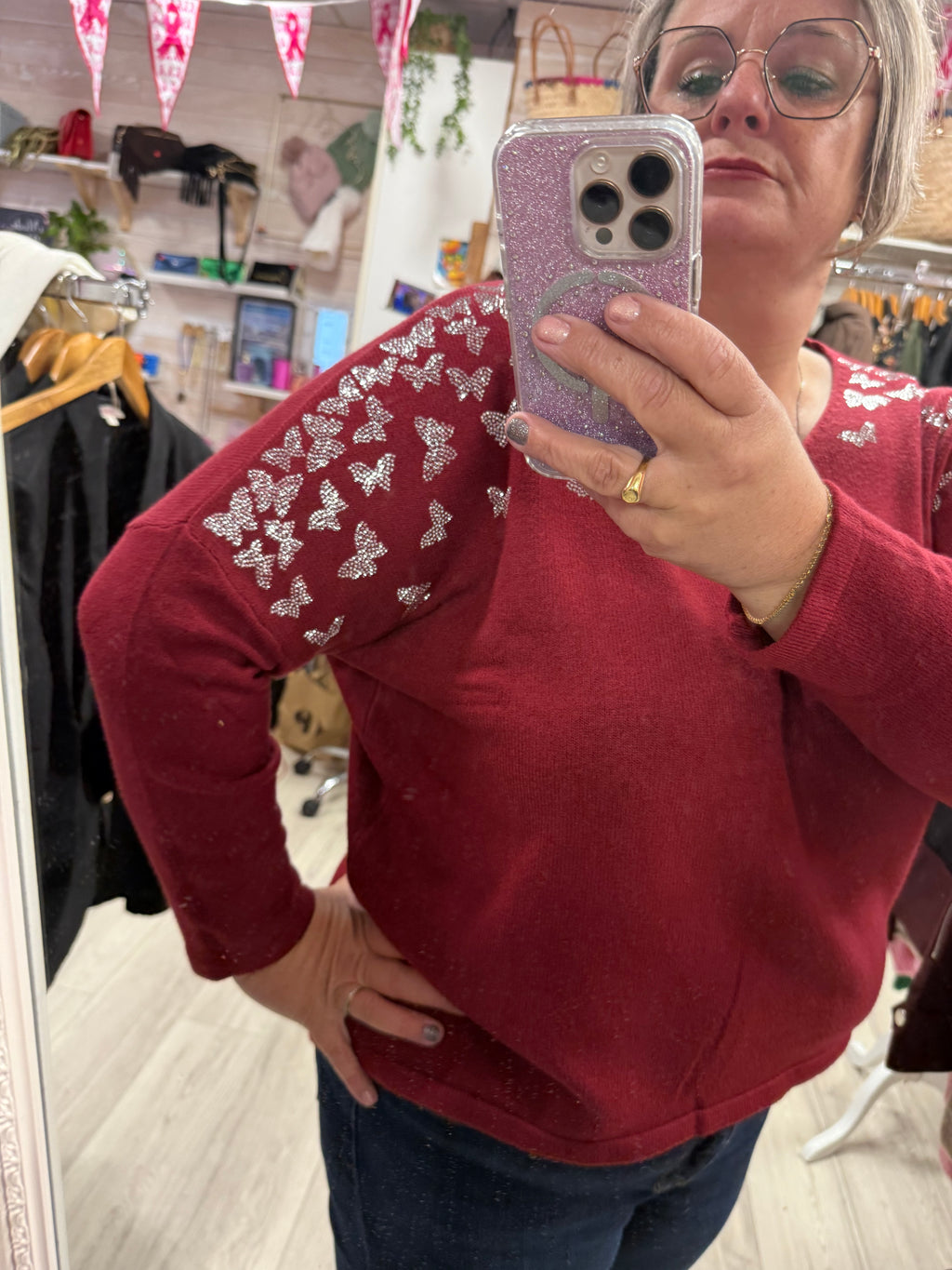 Pull bordeaux papillon